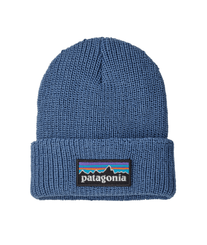 A blue Patagonia knit beanie hat with a folded cuff and the brand&
