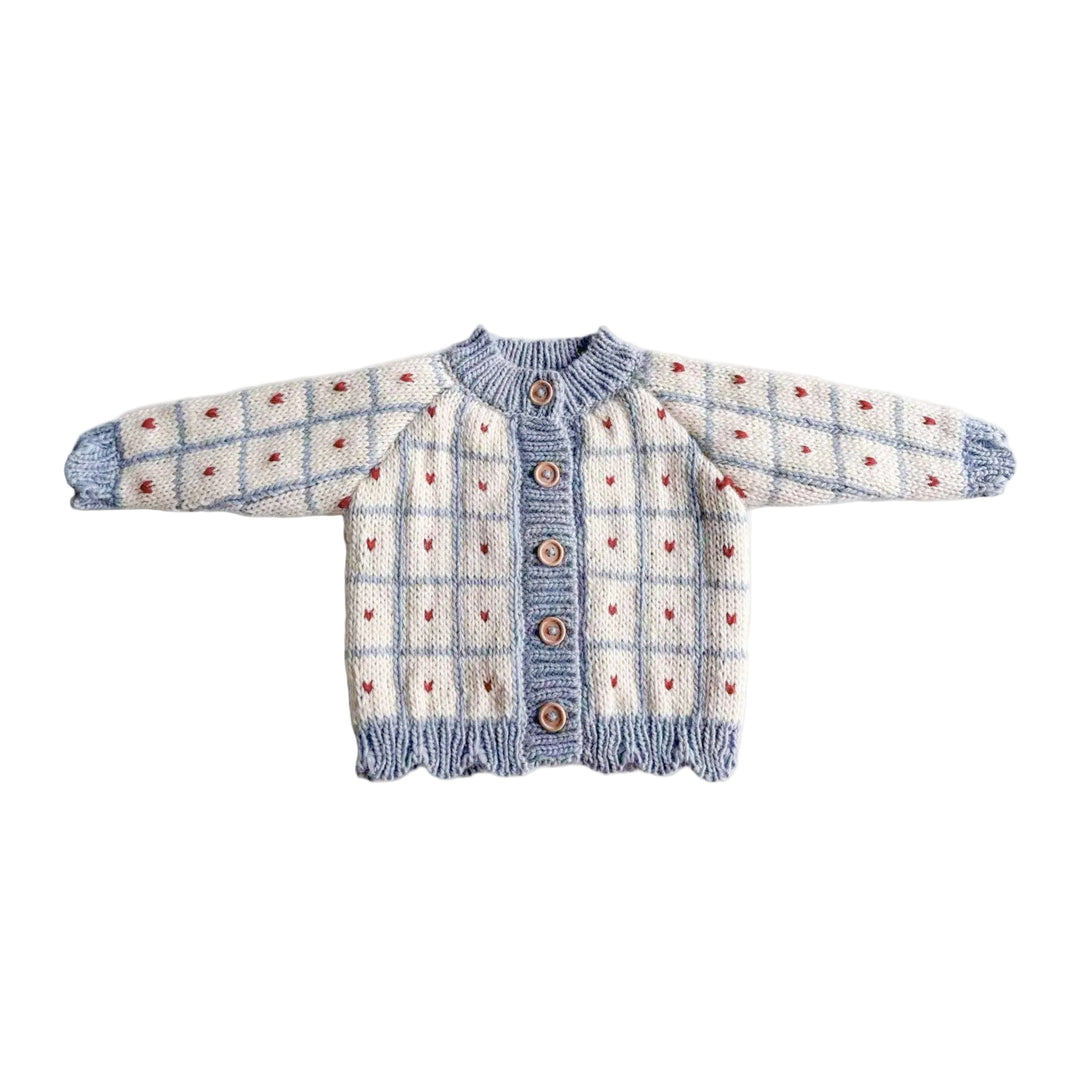 Knitted sweater with a checkered pattern on a white background