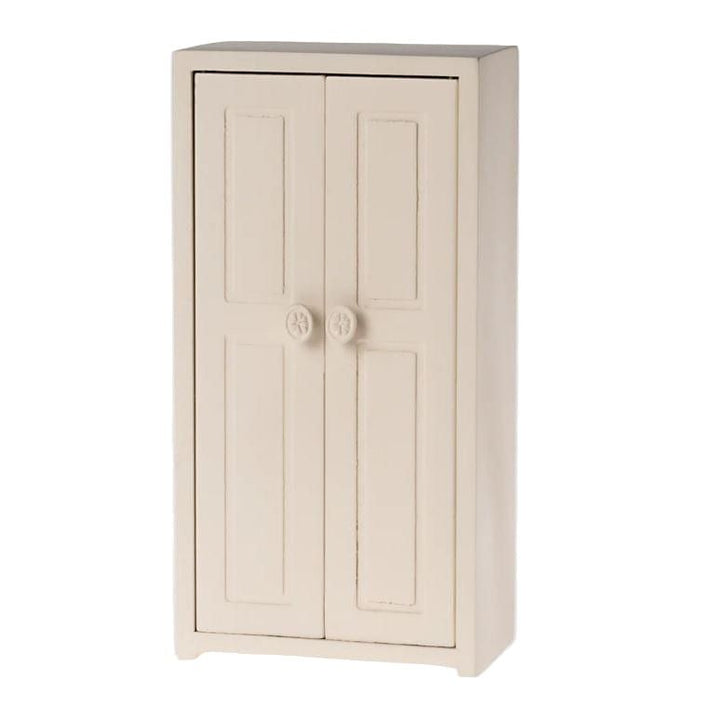 Beige cabinet with two doors on a white background