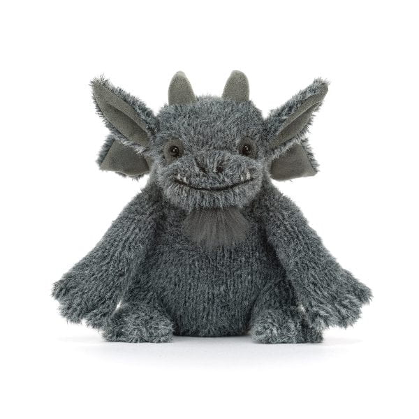 A gray plush gargoyle toy with large pointed ears, small horns, and a stitched smiling face, photographed against a clean white background.