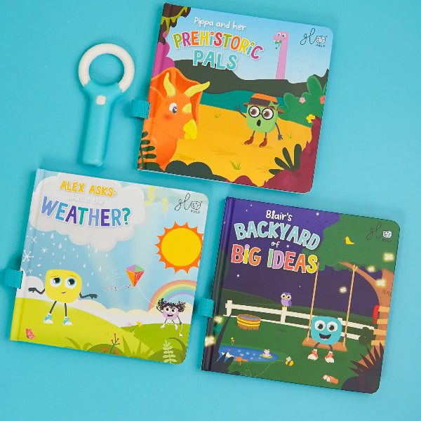 Three children's books on a blue background with a toy hook.