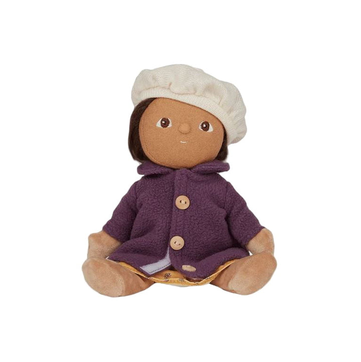 Stuffed toy with a purple coat and white hat on a light gray background