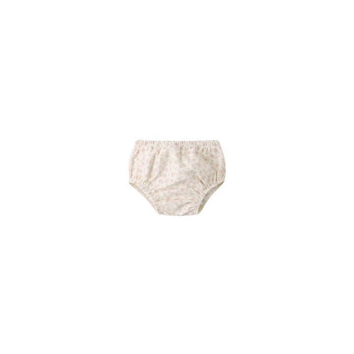 Beige baby bloomers on a white background