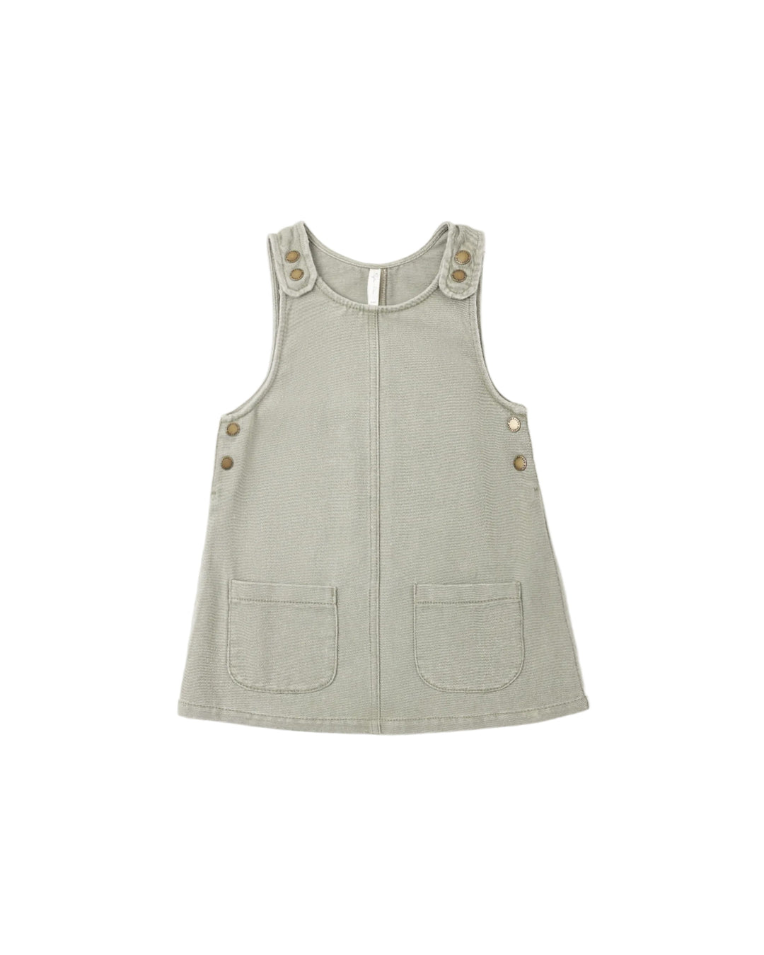 A sleeveless light sage green pinafore-style top with front pockets and decorative buttons on the shoulders and sides, shown on a plain white background.