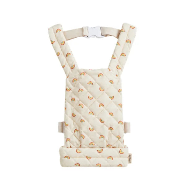 A quilted baby carrier seat pad in cream with a repeating rainbow pattern, shown against a plain white background.