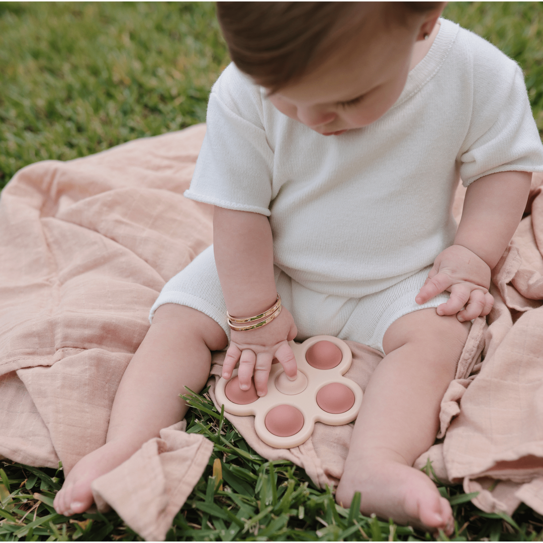 Mushie Flower Press Toy- Soft Lilac/Daffodil/Ivory Pacifiers and Teething Mushie   