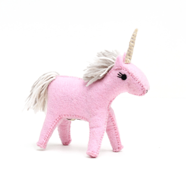 Pink unicorn plush toy on a white background