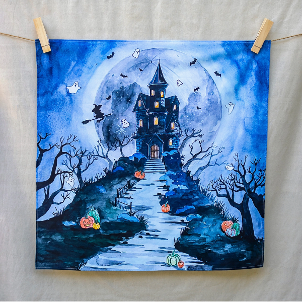 Halloween-themed artwork of a haunted house with pumpkins and ghosts on a blue background.