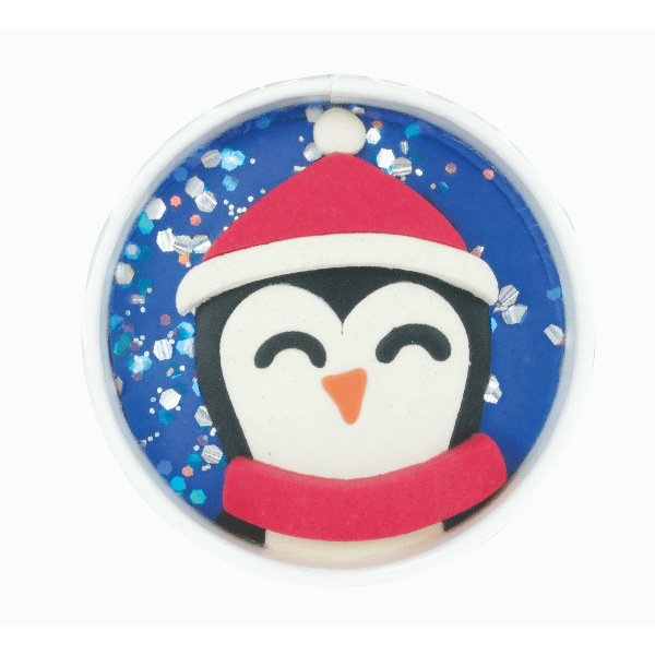 Penguin with a Santa hat and scarf on a blue background