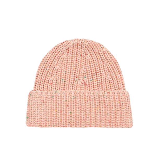 Pink knitted beanie on a beige background