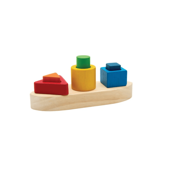 Wooden boat puzzle with multi colored stacked blocks.