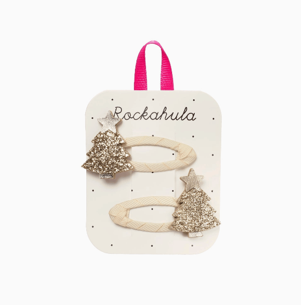 Set of hair accessories on a Rockahula branded card with a pink handle.