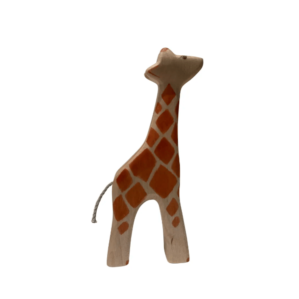 Wooden giraffe toy on a white background
