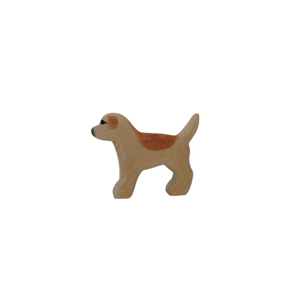Wooden dog figurine on a white background