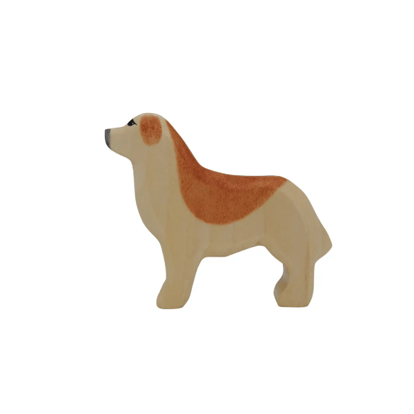 Wooden dog figurine on a white background