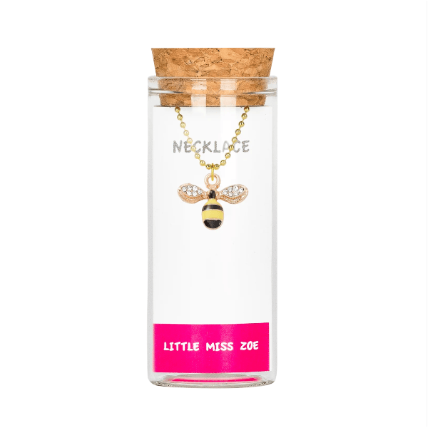Necklace with bee pendant in a glass jar labeled 'Little Miss Zoe' on a white background