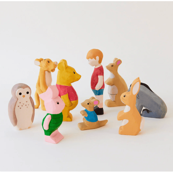 Set of colorful animal figurines on a white background