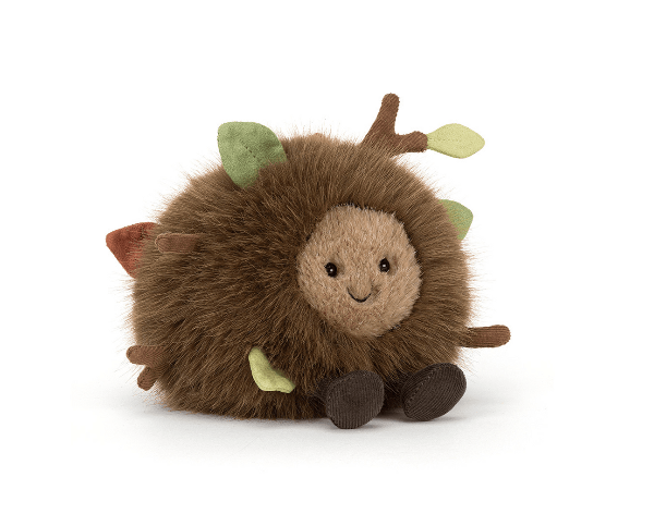 Plush toy with a smiling face on a white background