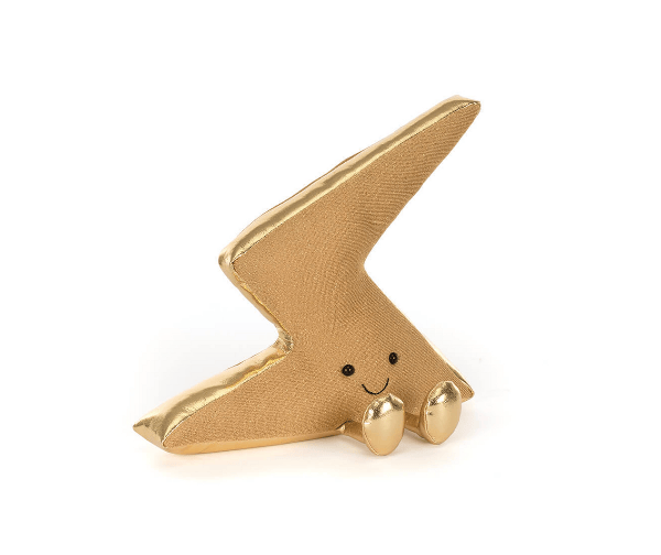 Gold lightning bolt-shaped object with a smiling face on a white background