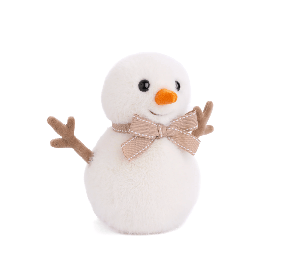 A plush snowman toy with a fluffy white body, small black eyes, a bright orange carrot nose, twig-style brown arms, and a beige ribbon bow around the neck, shown on a plain white background.