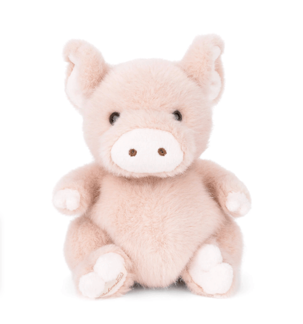 A plush toy pig in a soft blush pink color with a white snout, white hooves, and small black bead eyes, sitting against a solid white background.