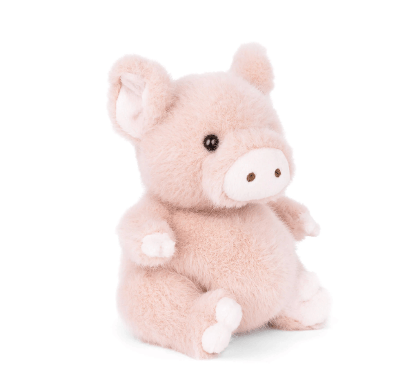 A small plush toy pig in a soft blush pink color, sitting on a clean white background.
