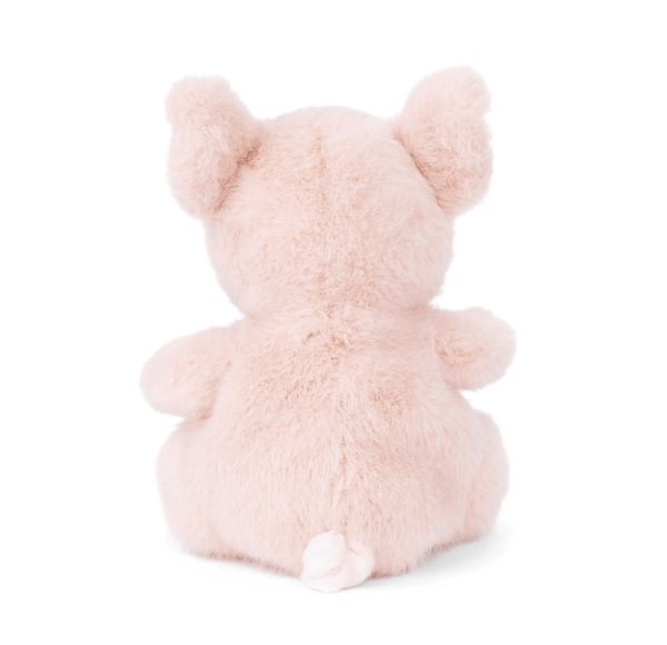 A light pink plush toy shaped like a pig, shown from the back against a solid white background.