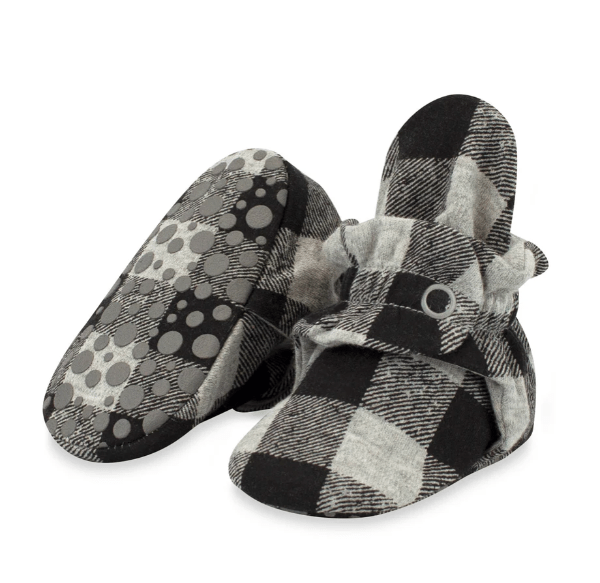 Baby bootie with grey and black checkered print.