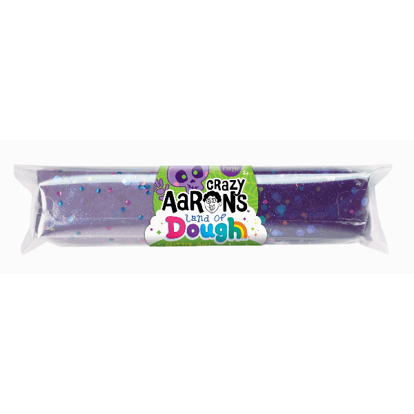 Purple dough with sprinkles in a clear package labeled 'Crazy Aaron's Land of Dough'.
