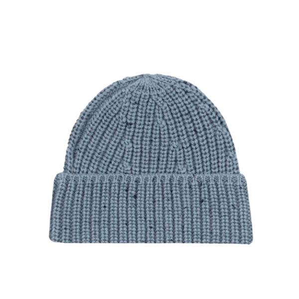 Blue knit beanie on a beige background