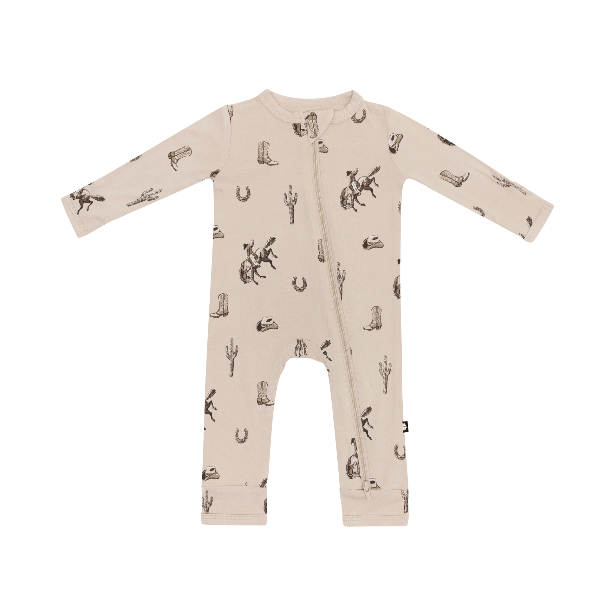 Baby onesie with cowboy print on a white background