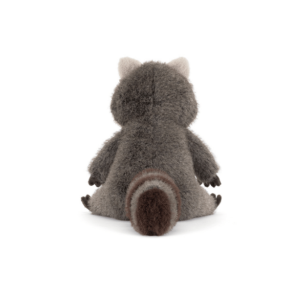 Plush toy raccoon on a white background