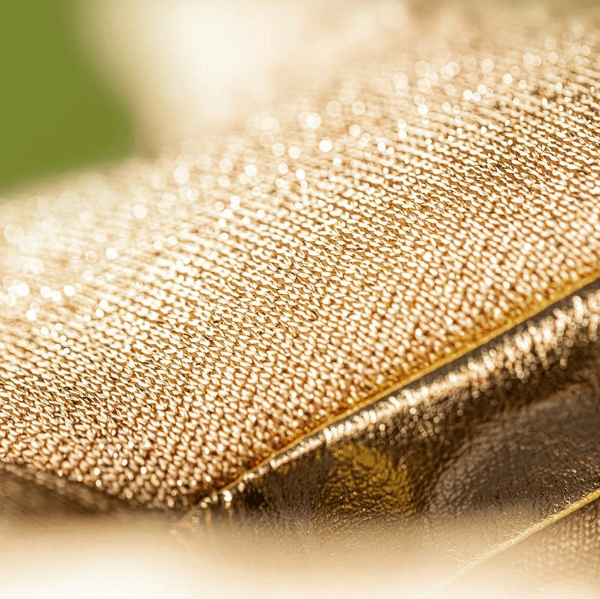 Close-up of a textured gold surface