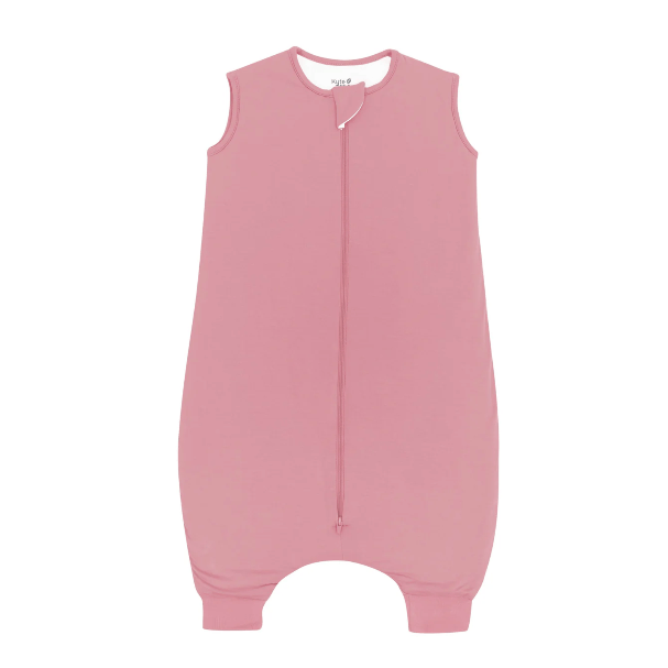 Pink baby sleeping bag on a white background