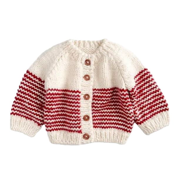 Knitted cardigan with white and red pattern on a white background