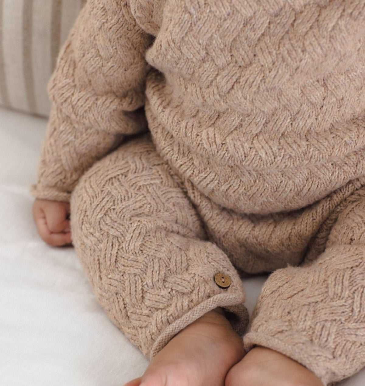 Baby wearing a comfy knitted sweater set
