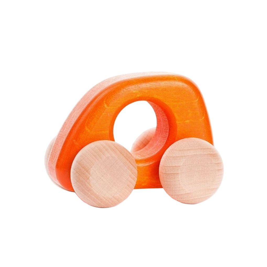 Wooden toy with orange arch and round wooden pieces on a white background