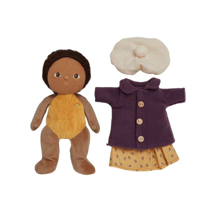 Plush doll with a purple coat and yellow dress on a white background