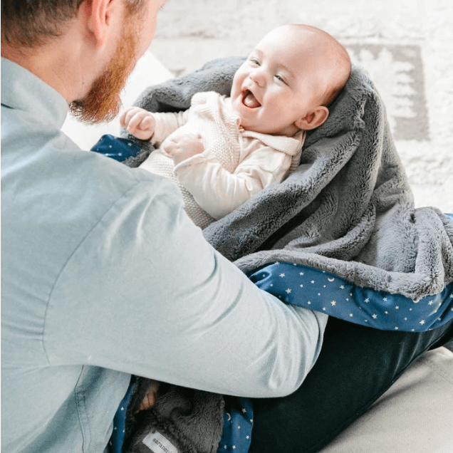 Newborn baby receiving 2025 blanket